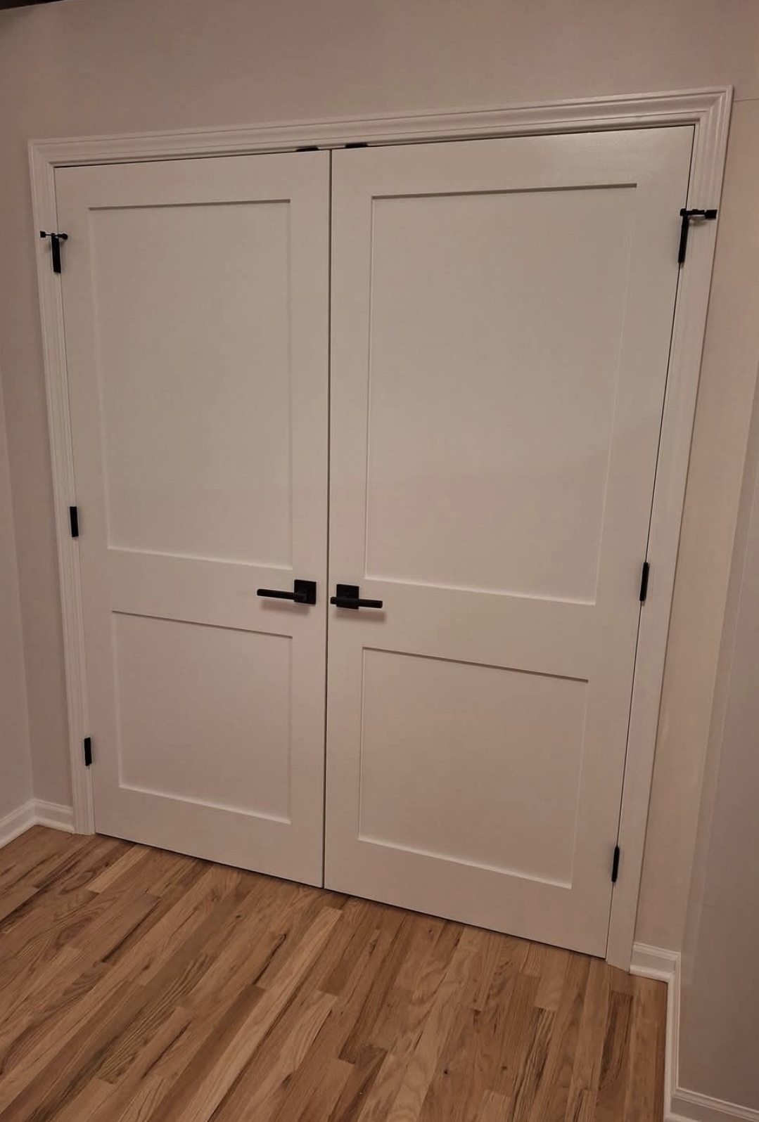 White double closet doors with clean trim work
